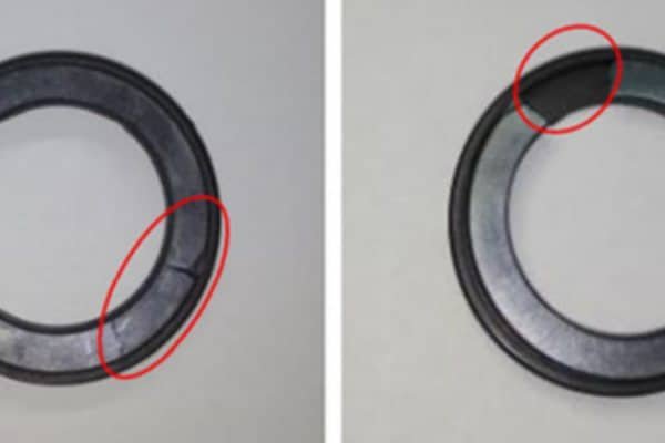 A diagram illustrating how VFD-induced bearing vibration leads to face cracking and leakage in pump mechanical seals.