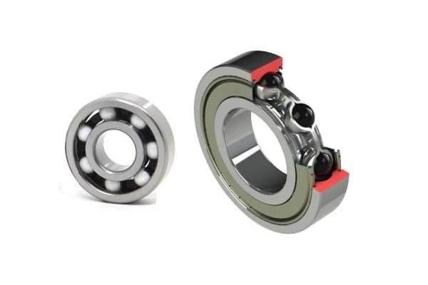 Cutaway view of a hybrid ceramic bearing showcasing black Silicon Nitride rolling elements housed within standard steel inner and outer rings.